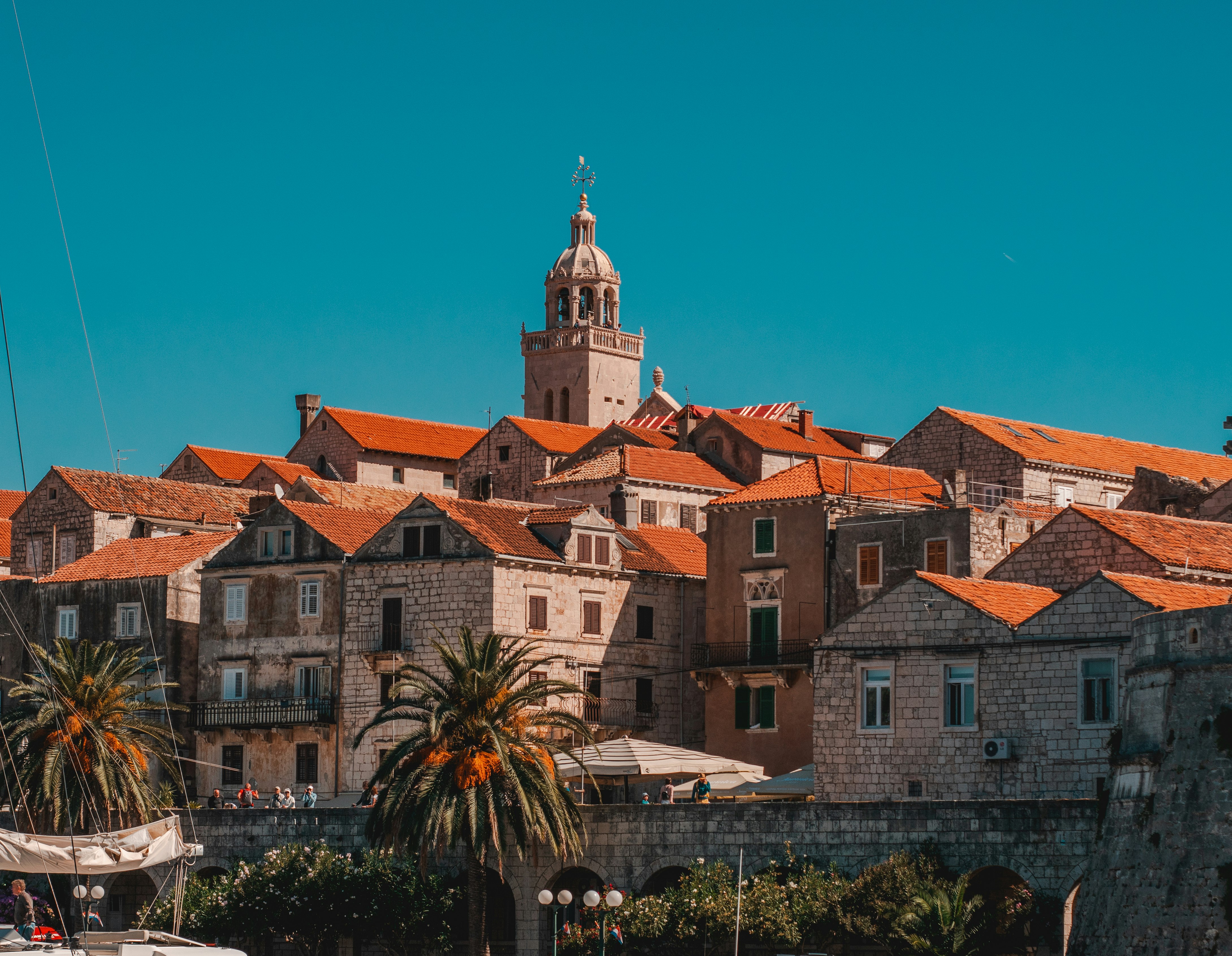 red roof concrete houses under clear blue sky